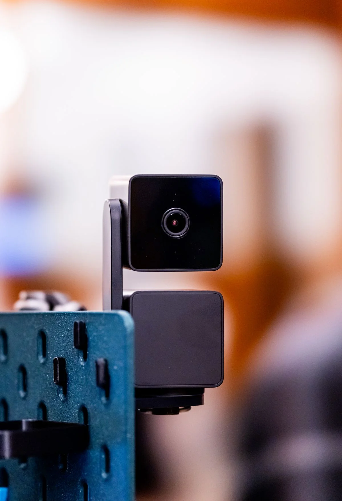 Compact camera with a mounting bracket