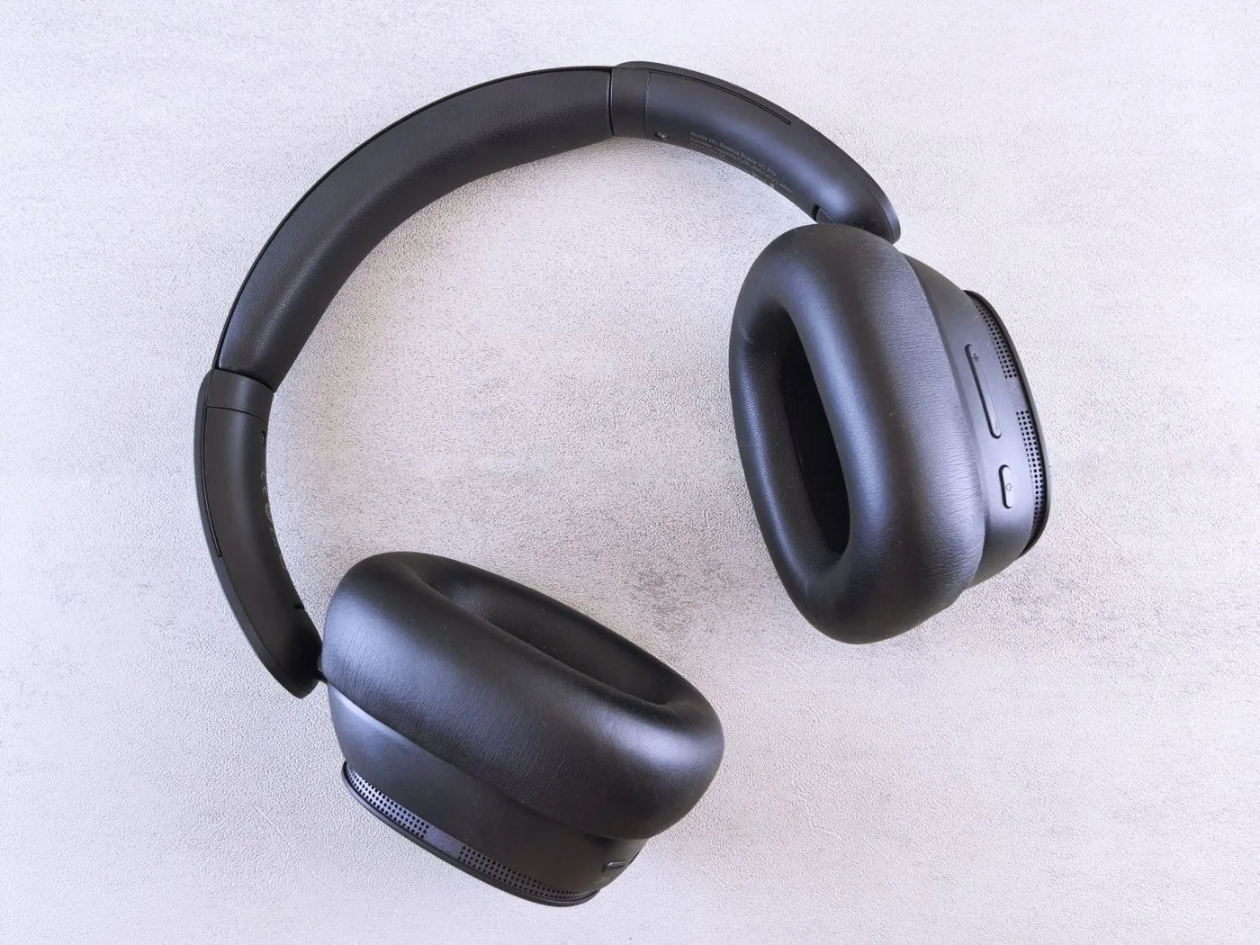 Wireless headphones on a light surface