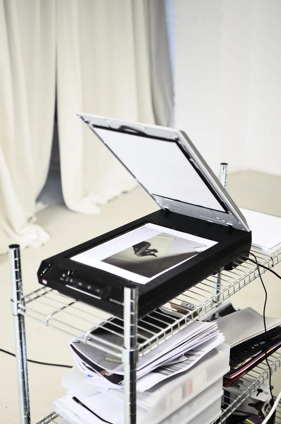 Open flatbed scanner with a document