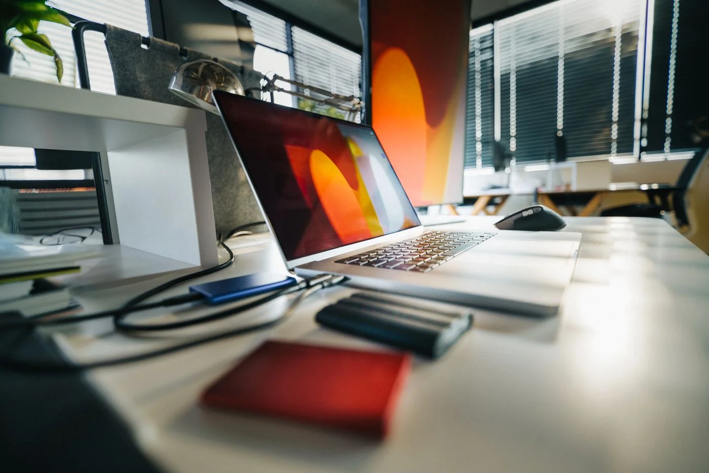 External drives beside a laptop