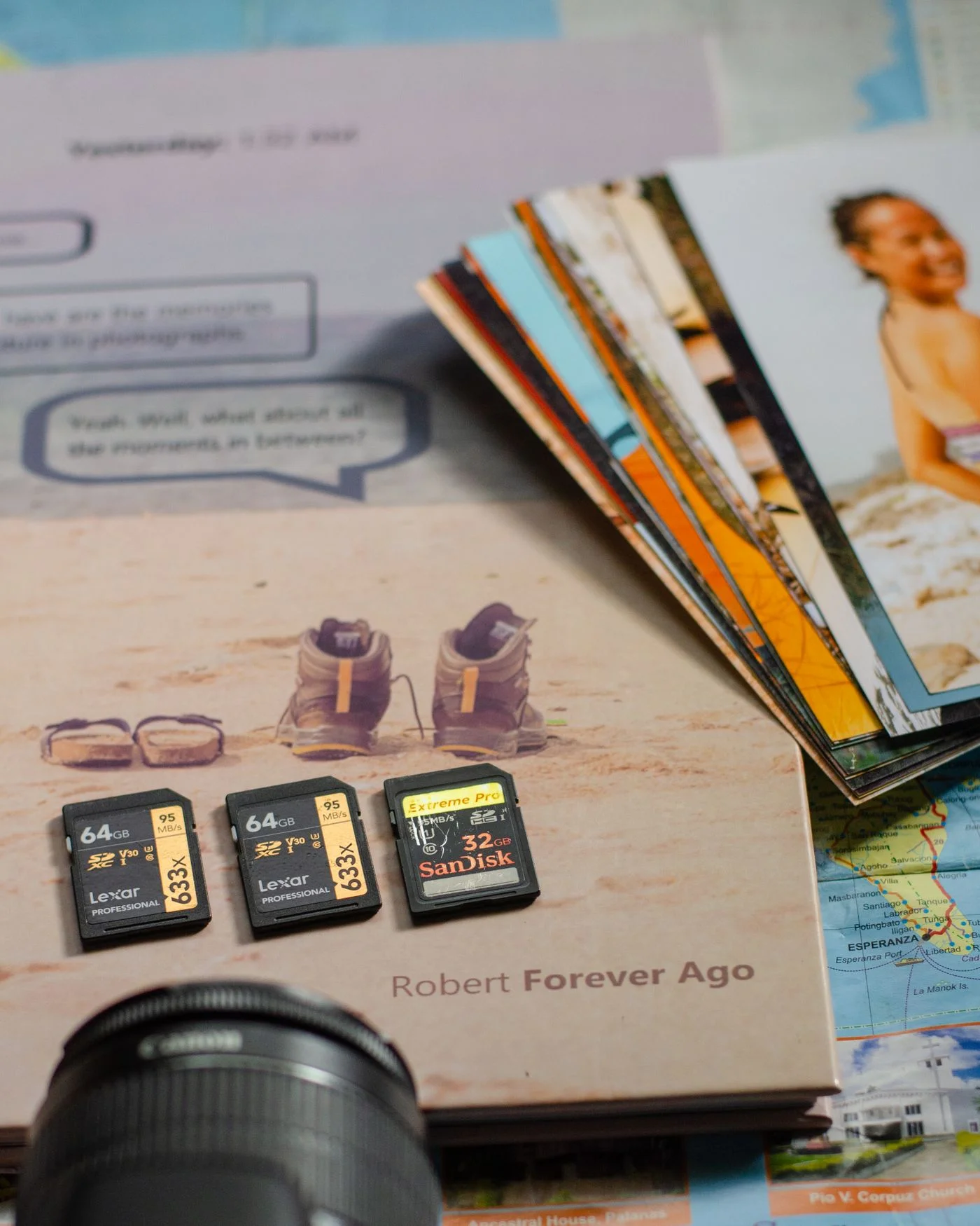 SD cards beside photography equipment